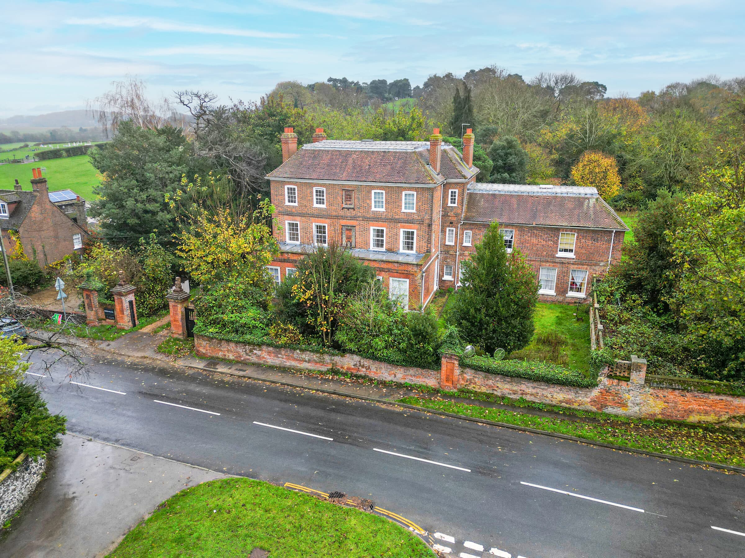 Aerial drone photograph of a UK property and its surroundings.