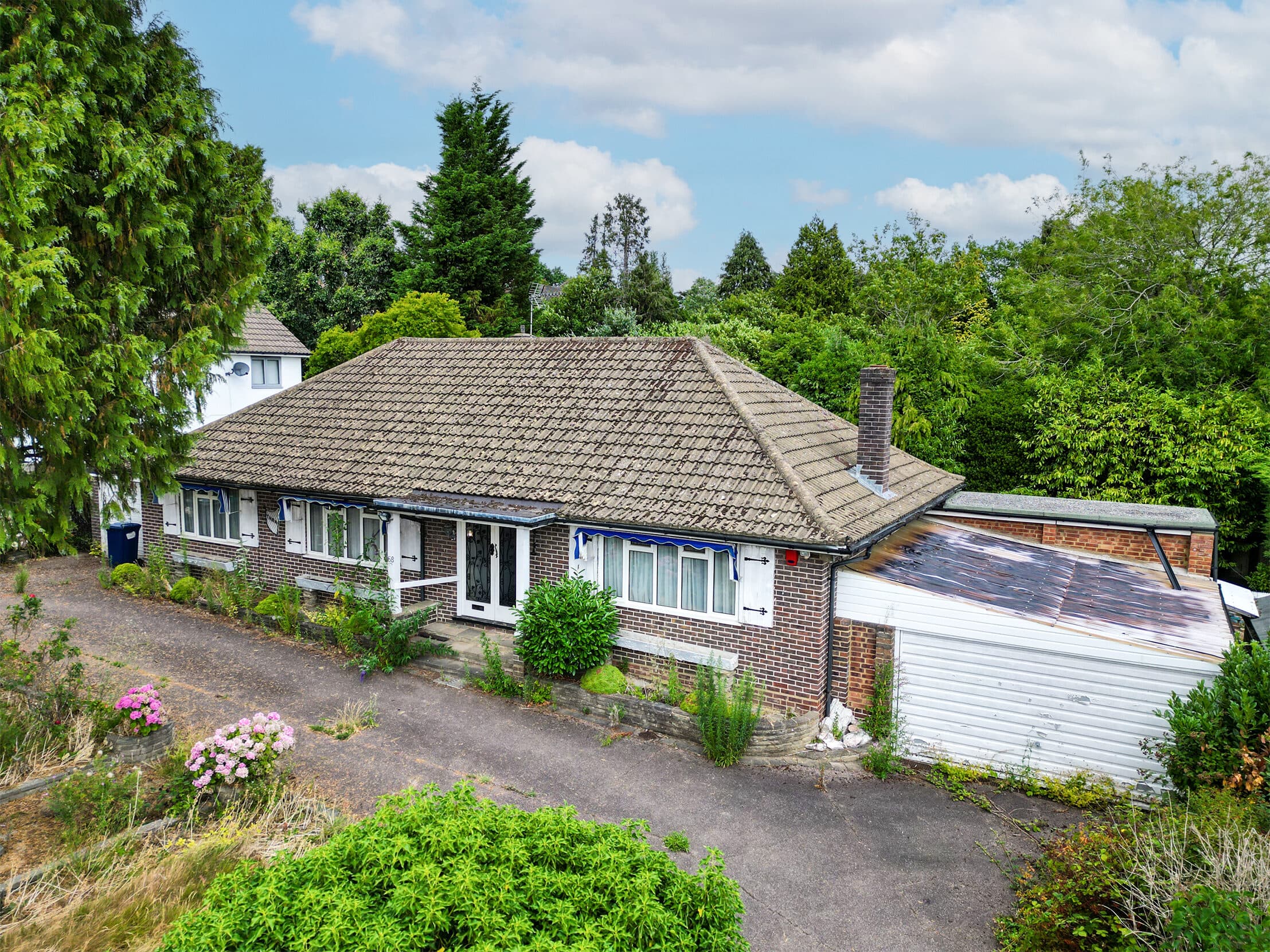 Aerial drone photograph of a UK property and its surroundings.