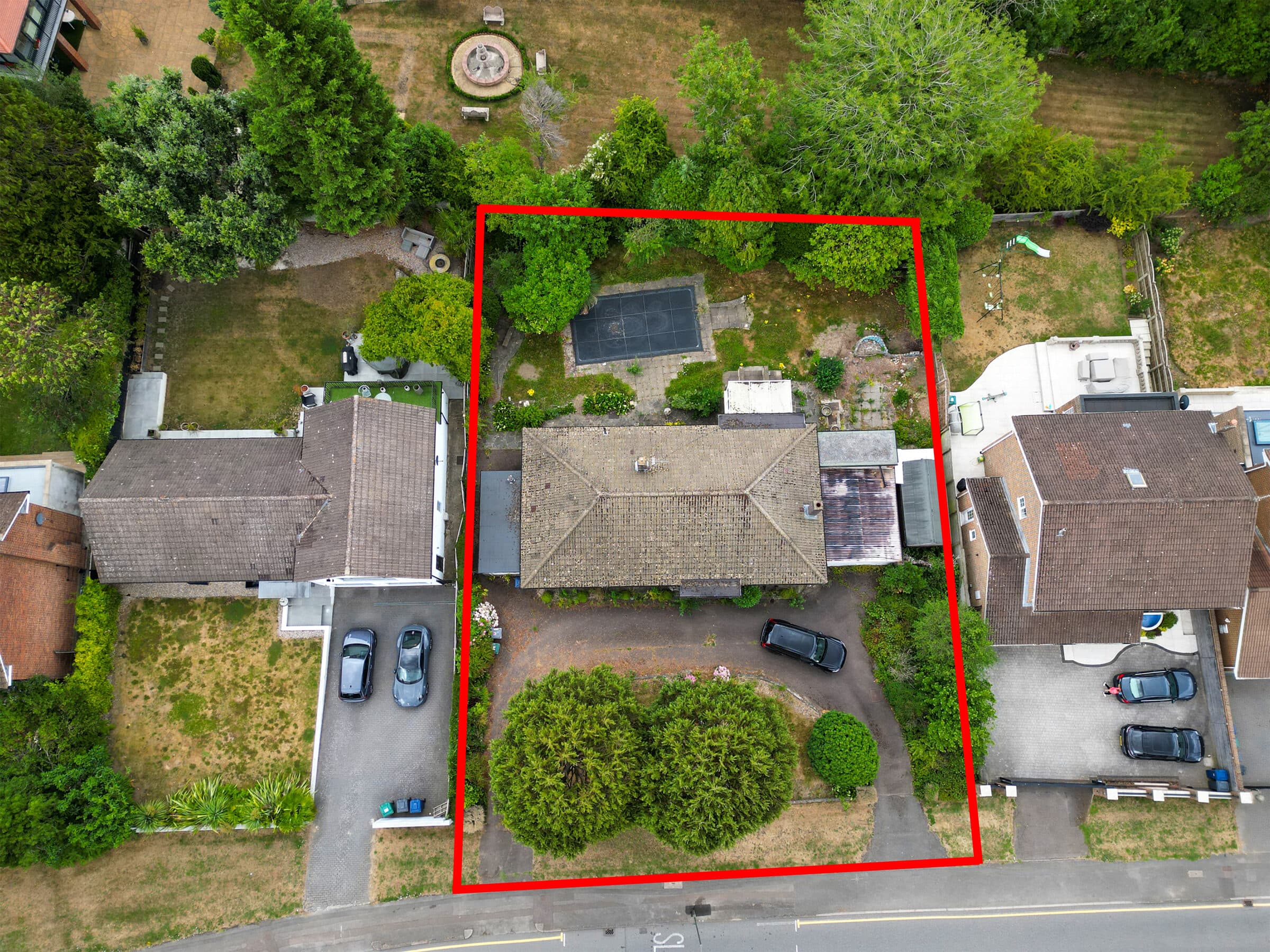 Aerial drone photograph of a UK property and its surroundings.