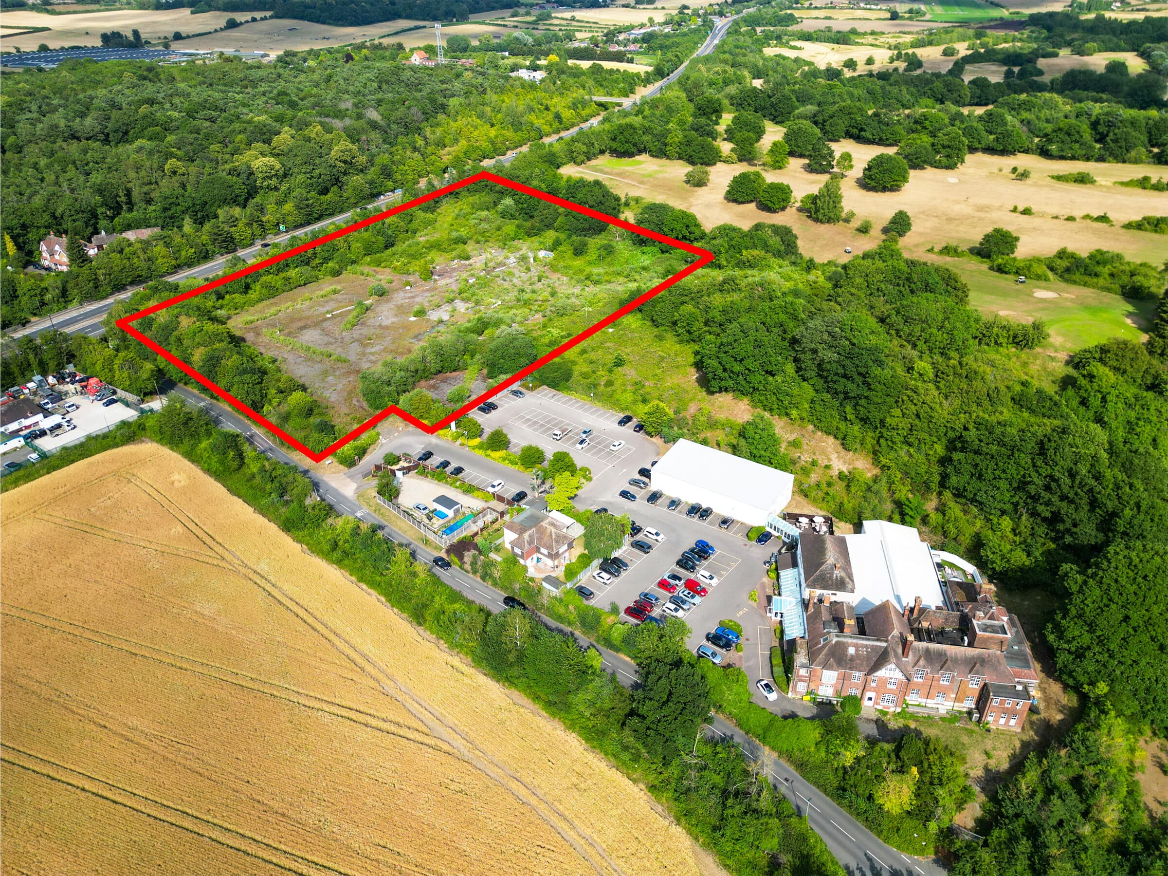 Aerial drone photograph of a UK property and its surroundings.