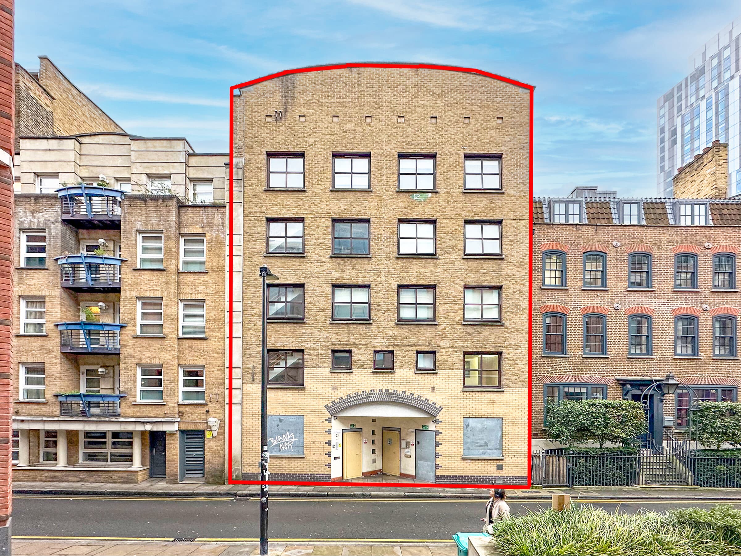 Exterior photograph of a residential apartment building, ready for accompanied viewings.